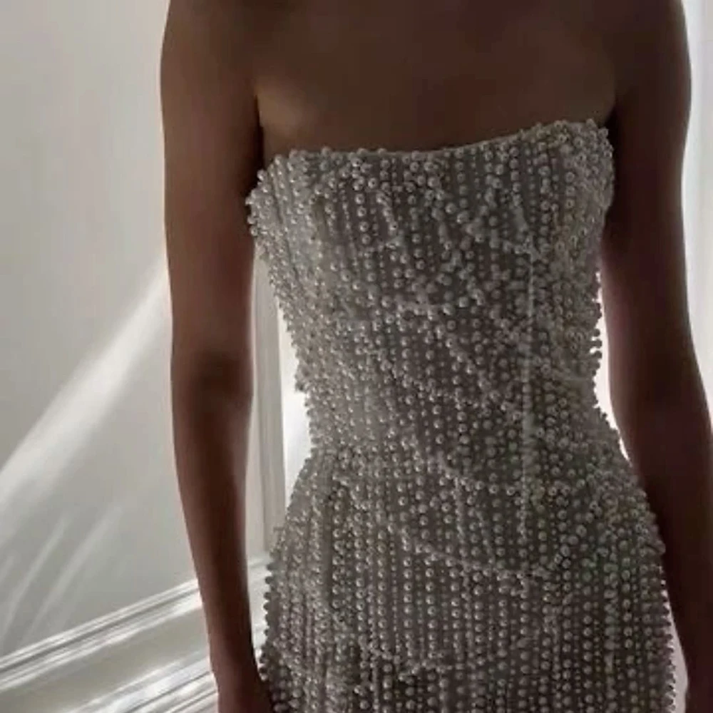 Luxury Pearl Embroidery Strapless Mermaid Evening Dresses Fully Covered with Beads Sleeveless Bridal Gown for Wedding Party
Luxury Pearl Embroidery Strapless Mermaid Evening Dresses Fully Covered with Beads Sleeveless Bridal Gown for Wedding Party