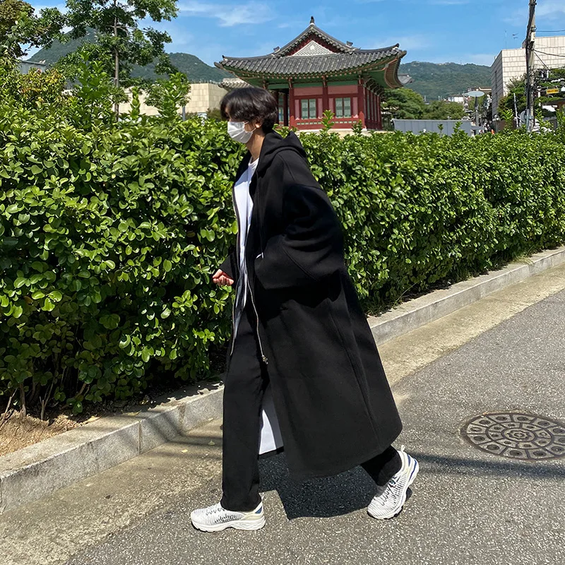 Woolen Coat Men's Autumn and Winter Knee-length Korean Version of The Trend Loose Wild Windbreaker Hooded Coat.
Woolen Coat Men's Autumn and Winter Knee-length Korean Version of The Trend Loose Wild Windbreaker Hooded Coat.