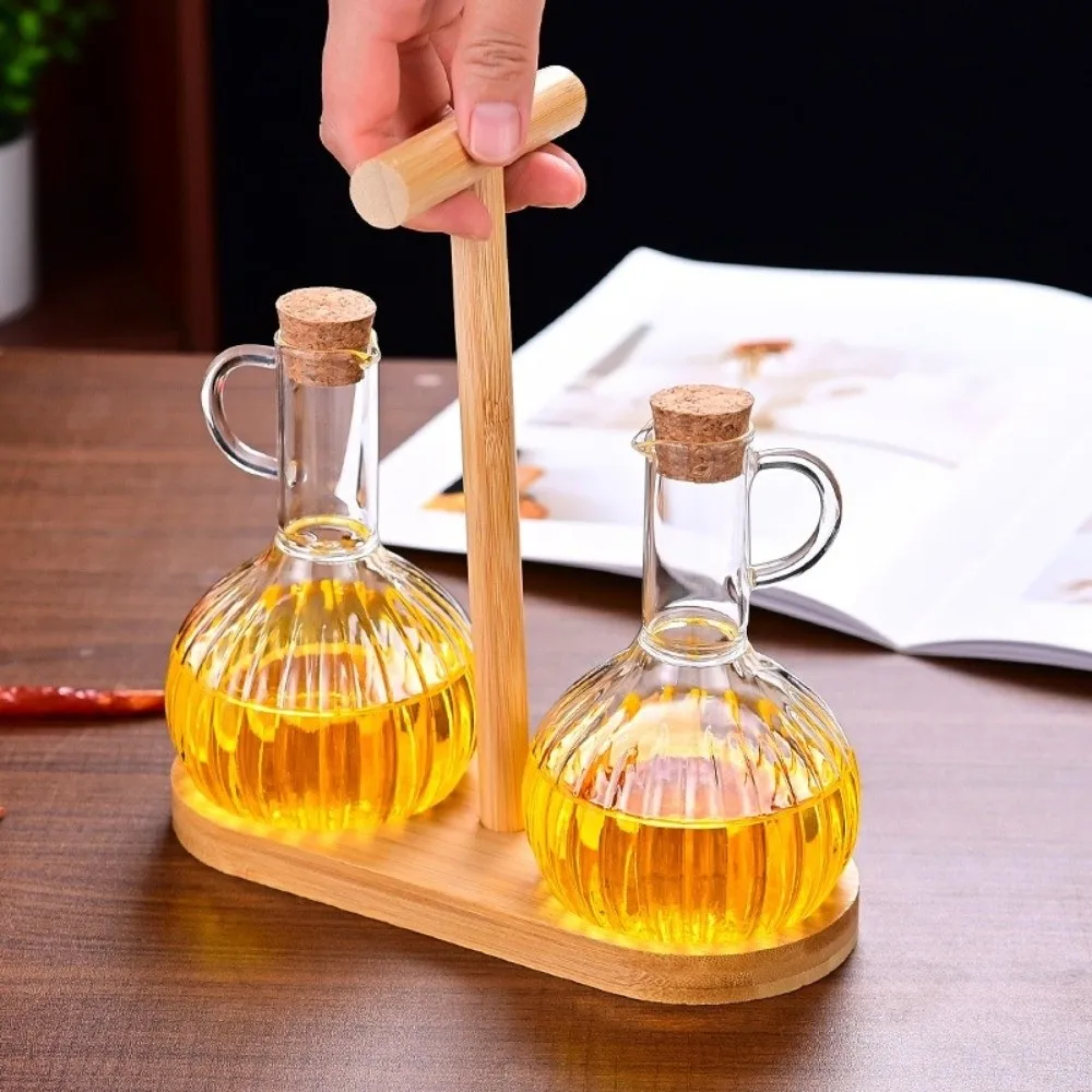Wooden Stand Glass Oil Pot Transparent Bottle Sealed Storage Liquid Seasoning Bottle High-Temperature Resistant Leak-proof
Wooden Stand Glass Oil Pot Transparent Bottle Sealed Storage Liquid Seasoning Bottle High-Temperature Resistant Leak-proof