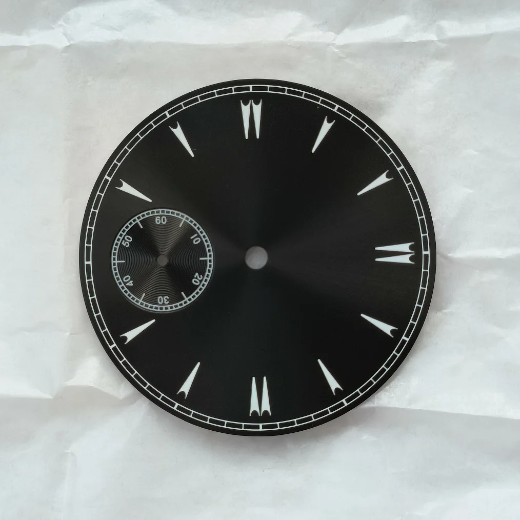 Watch dial diameter 38.9mm black dial Thickness 0.4mm second hand is at 9 o 'clock Fits ETA6497 ST3600 movement
Watch dial diameter 38.9mm black dial Thickness 0.4mm second hand is at 9 o 'clock Fits ETA6497 ST3600 movement