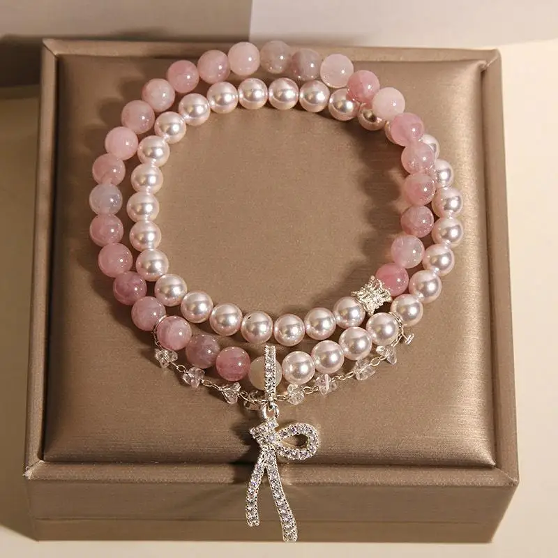 Новый женский браслет с жемчужным бантом в китайском стиле, двойной круг, легкий роскошный нишевый изысканный высококачественный браслет с розовыми кристаллами для лучшего друга
Новый женский браслет с жемчужным бантом в китайском стиле, двойной круг, легкий роскошный нишевый изысканный высококачественный браслет с розовыми кристаллами для лучшего друга