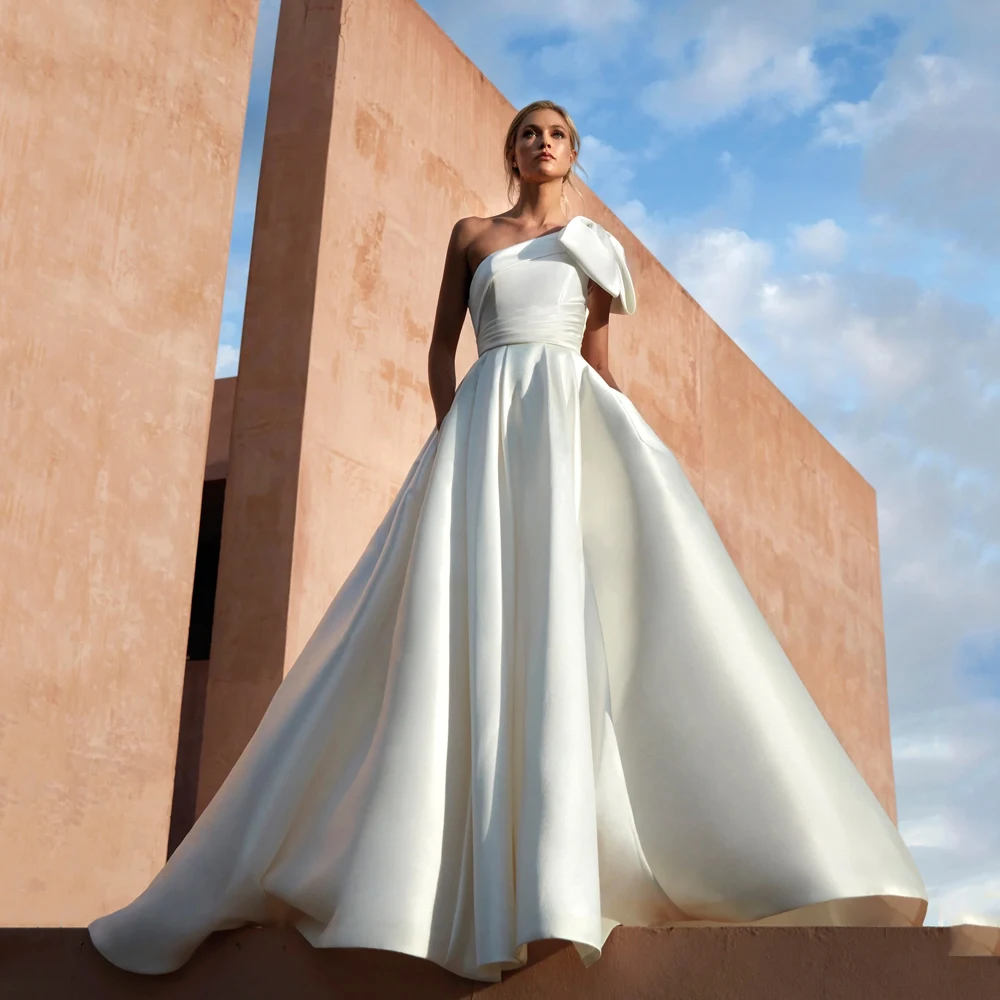 Simple One Shoulder Wedding Dresses Sleeveless Bridal Gowns Bow Back Zipper Floor Length A-Line Satin Vestidos De Novia 2024
Simple One Shoulder Wedding Dresses Sleeveless Bridal Gowns Bow Back Zipper Floor Length A-Line Satin Vestidos De Novia 2024