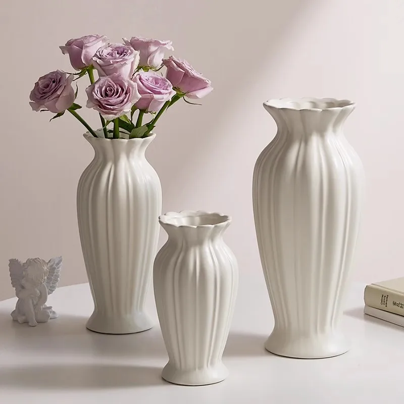 White Simple Retro Ceramic Vase Home Living Room Dining Table Decoration Flower Utensils and Ornaments
White Simple Retro Ceramic Vase Home Living Room Dining Table Decoration Flower Utensils and Ornaments