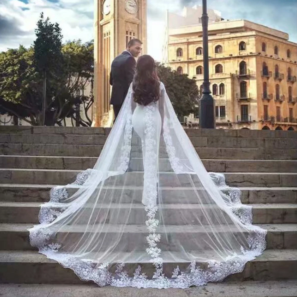 White Appliques Wedding Dresses Cape Bridal Gowns Long Cloak Summer Elegant Tulle Wedding Women Formal Bolero Bridal Wrap
White Appliques Wedding Dresses Cape Bridal Gowns Long Cloak Summer Elegant Tulle Wedding Women Formal Bolero Bridal Wrap