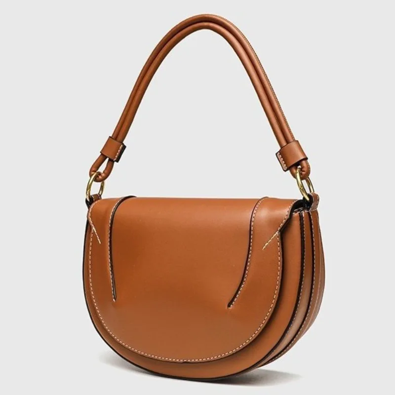 New model saddle bag with magnetic snap closure and lined flap decoration for carrying on the shoulder or as a crossbody bag
New model saddle bag with magnetic snap closure and lined flap decoration for carrying on the shoulder or as a crossbody bag