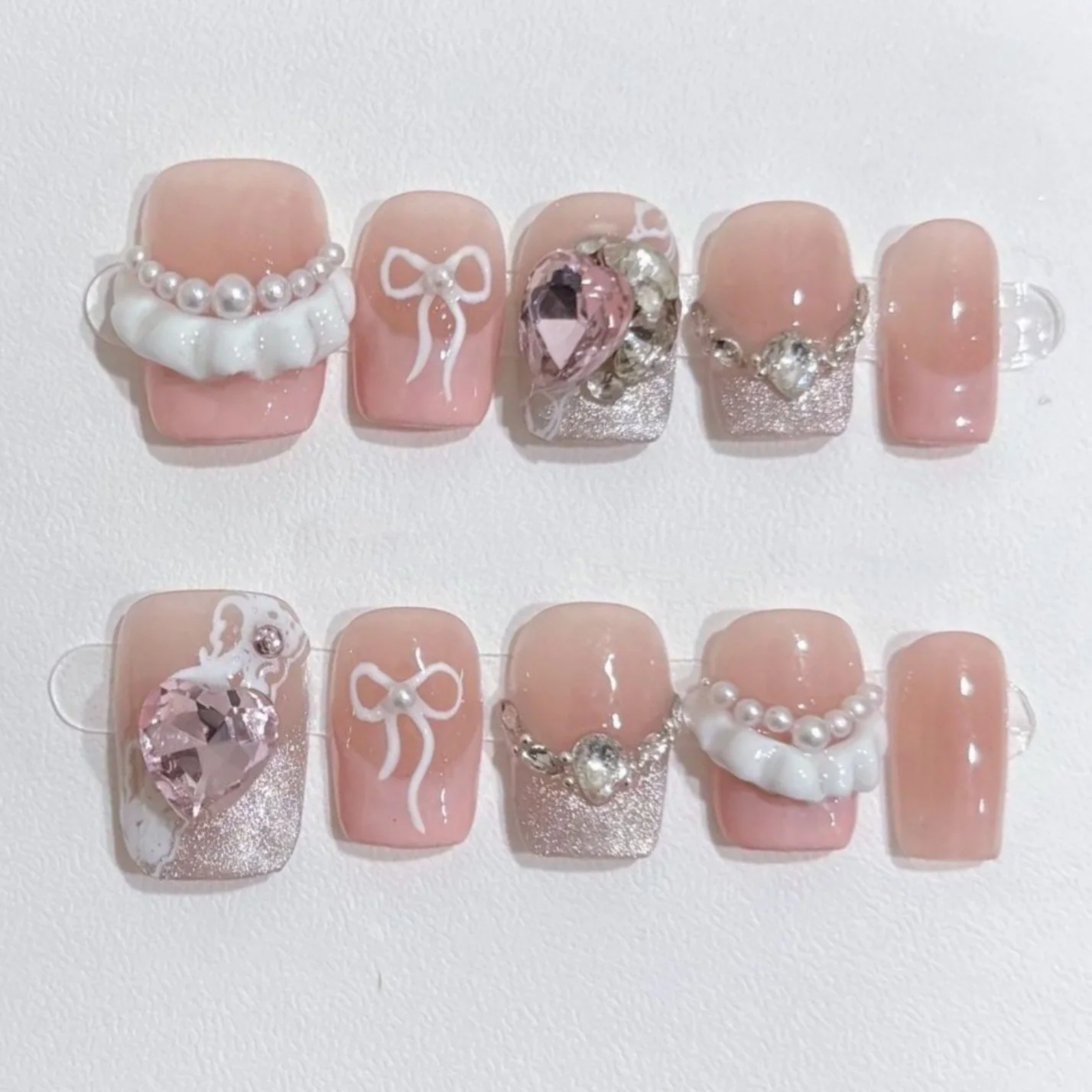 10pcs Pink French Handmade Press on Fake Nails Art Sweet Cute Bow Pearl Nails Tip Datachable Diamond Short Square False Nail Set
10pcs Pink French Handmade Press on Fake Nails Art Sweet Cute Bow Pearl Nails Tip Datachable Diamond Short Square False Nail Set