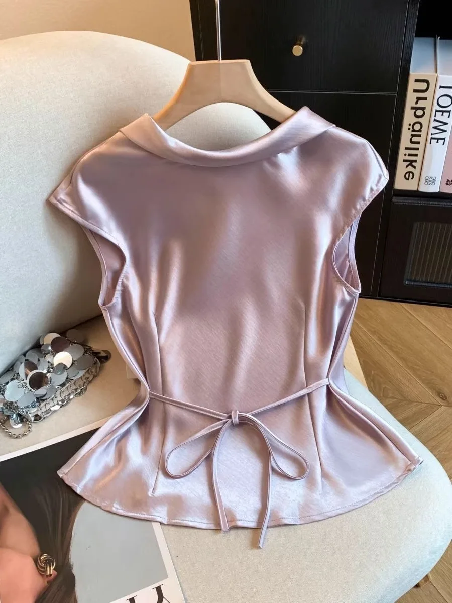 Glossy Acetate Satin Sleeveless Shirt Women's Summer New Style Waist-Cinching Fairy Wings Top Korean Style Loose Fit round Neck
Glossy Acetate Satin Sleeveless Shirt Women's Summer New Style Waist-Cinching Fairy Wings Top Korean Style Loose Fit round Neck