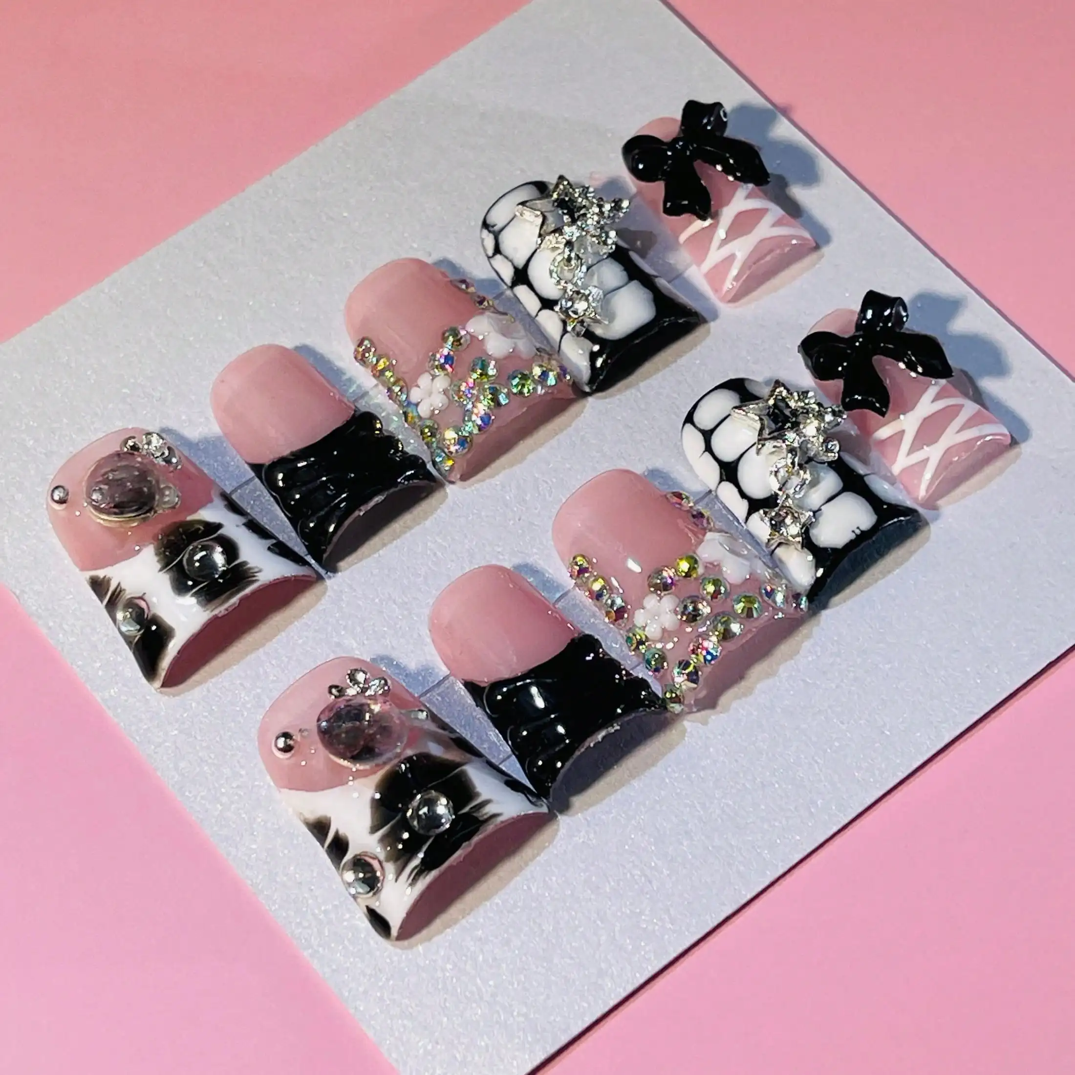 10 PCS Handmade Duckbill Press-On Nails | Pink-Black Y2K Cow Print & Bow Nails With Crystal & Bow Designs, Playful & Edgy Nail Art For Stylish Looks
10 PCS Handmade Duckbill Press-On Nails | Pink-Black Y2K Cow Print & Bow Nails With Crystal & Bow Designs, Playful & Edgy Nail Art For Stylish Looks