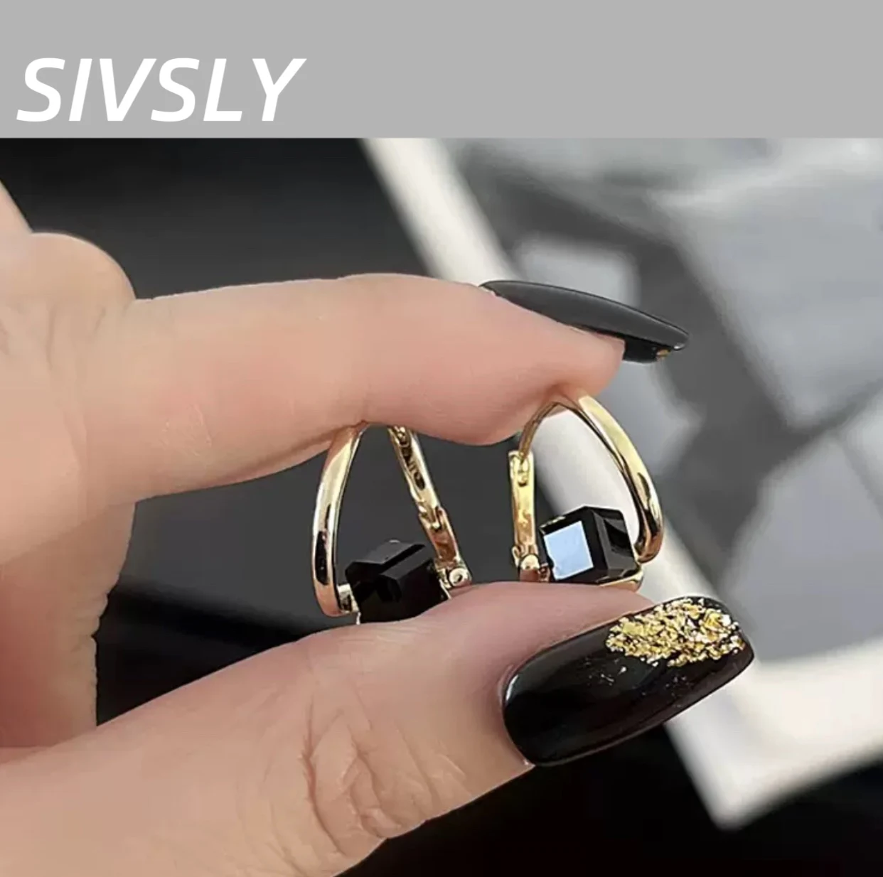 Design high-end sense irregular luxury black zircon ear clip exquisite fashion personality temperament high-end sense elegant
Design high-end sense irregular luxury black zircon ear clip exquisite fashion personality temperament high-end sense elegant