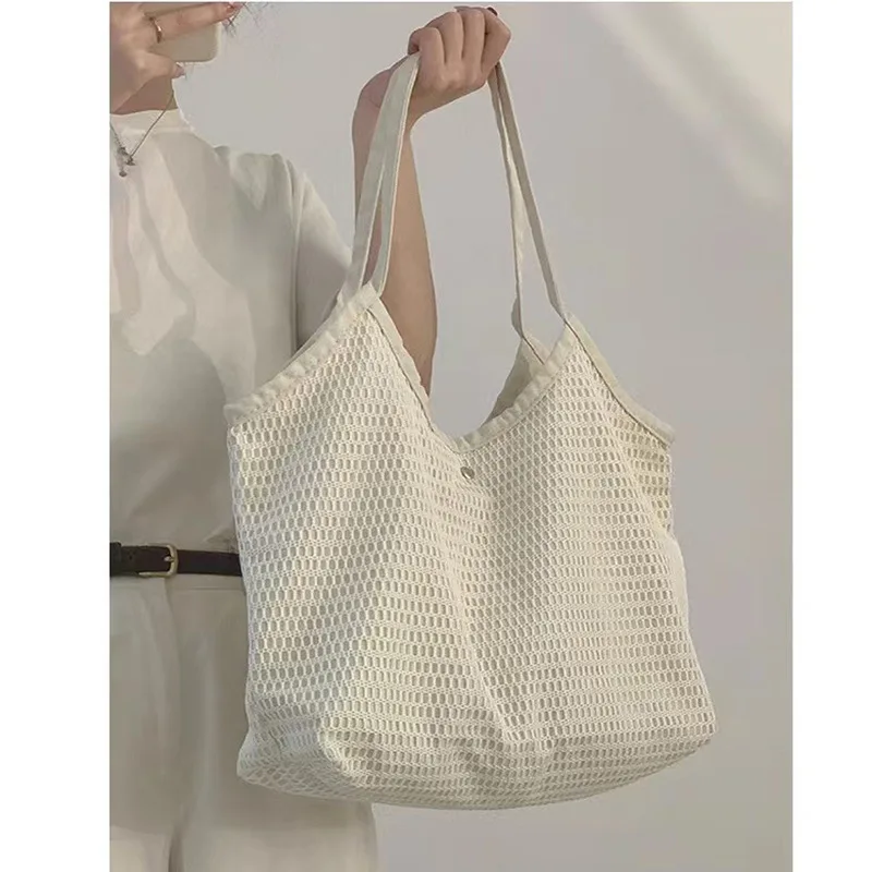 Summer stylish high-quality canvas tote bag large capacity fishing net beach bag large capacity hollow hollow women's vacation b
Summer stylish high-quality canvas tote bag large capacity fishing net beach bag large capacity hollow hollow women's vacation b