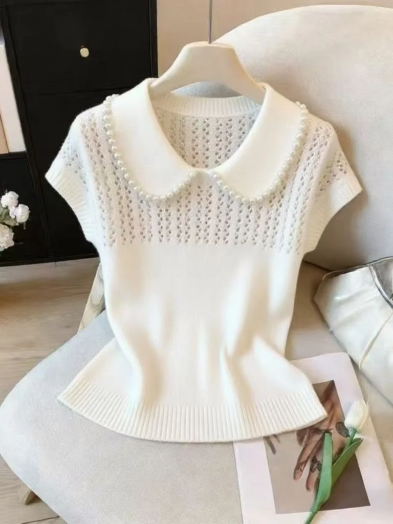 Elegant Knitted Short Sleeve Doll Collar Top Pearl Hollow Design Slimming Fashionable Summer New Style Gentle Wind Women's Shirt
Elegant Knitted Short Sleeve Doll Collar Top Pearl Hollow Design Slimming Fashionable Summer New Style Gentle Wind Women's Shirt