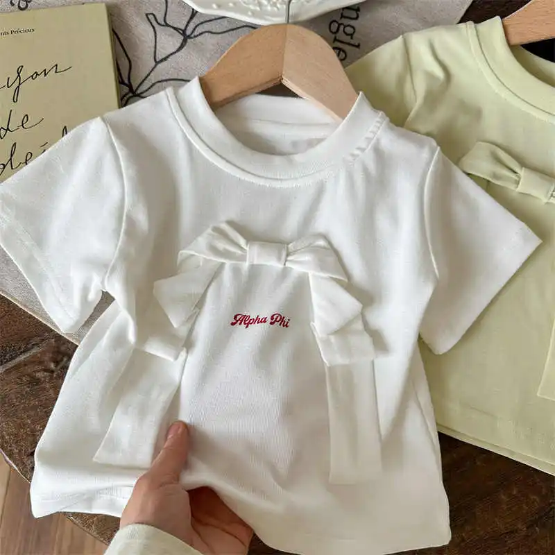 Baby Girls' Bow Short Sleeve T-shirt Summer Children's Round Neck Loose Letter Top Girls New Versatile Tees 2025 New
Baby Girls' Bow Short Sleeve T-shirt Summer Children's Round Neck Loose Letter Top Girls New Versatile Tees 2025 New