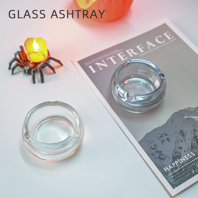 Round glass ashtray European style fashionable simple small, living room conference room light luxury anti fly ash ashtray
Round glass ashtray European style fashionable simple small, living room conference room light luxury anti fly ash ashtray