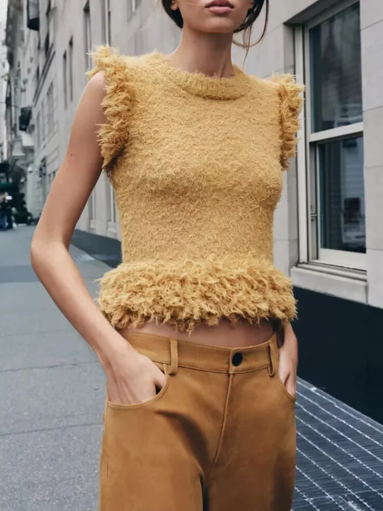 Новый женский модный универсальный темпераментный однотонный вязаный топ без рукавов с эффектом искусственного меха в европейском стиле
Новый женский модный универсальный темпераментный однотонный вязаный топ без рукавов с эффектом искусственного меха в европейском стиле