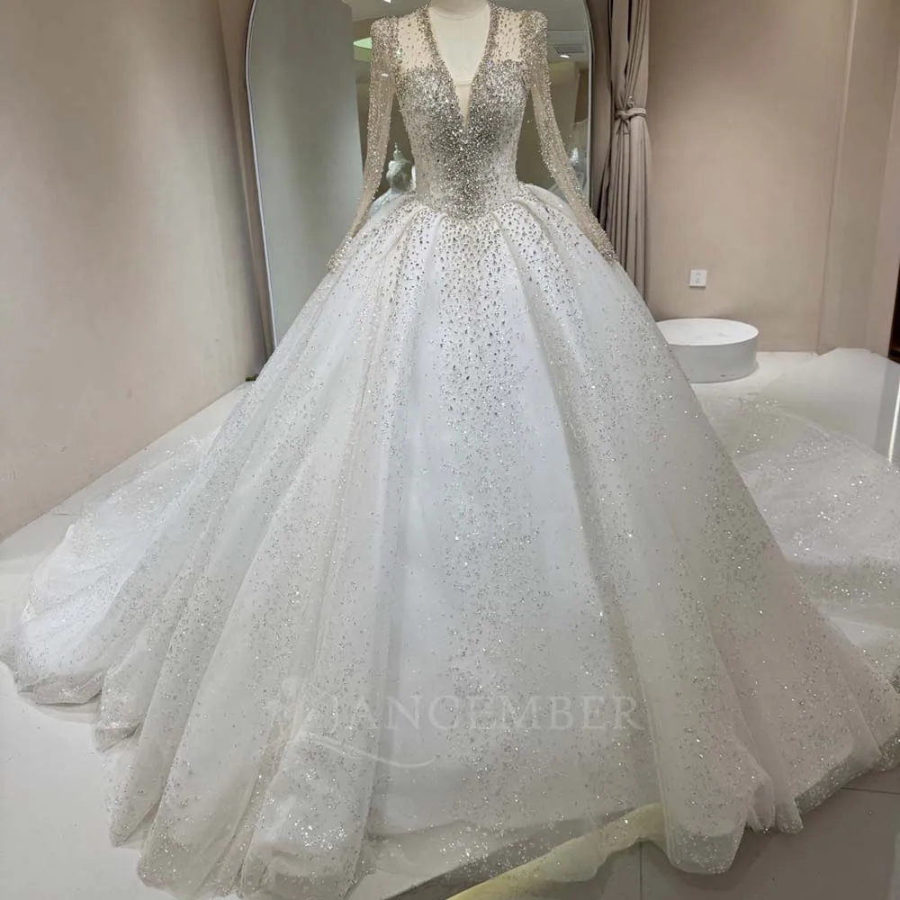 Customized New Elegant Organza Bride Dress with Illusion Long Sleeves Beaded Ball Gown Bridal Gown Vestidos De Novia Lace Up Bac
Customized New Elegant Organza Bride Dress with Illusion Long Sleeves Beaded Ball Gown Bridal Gown Vestidos De Novia Lace Up Bac
