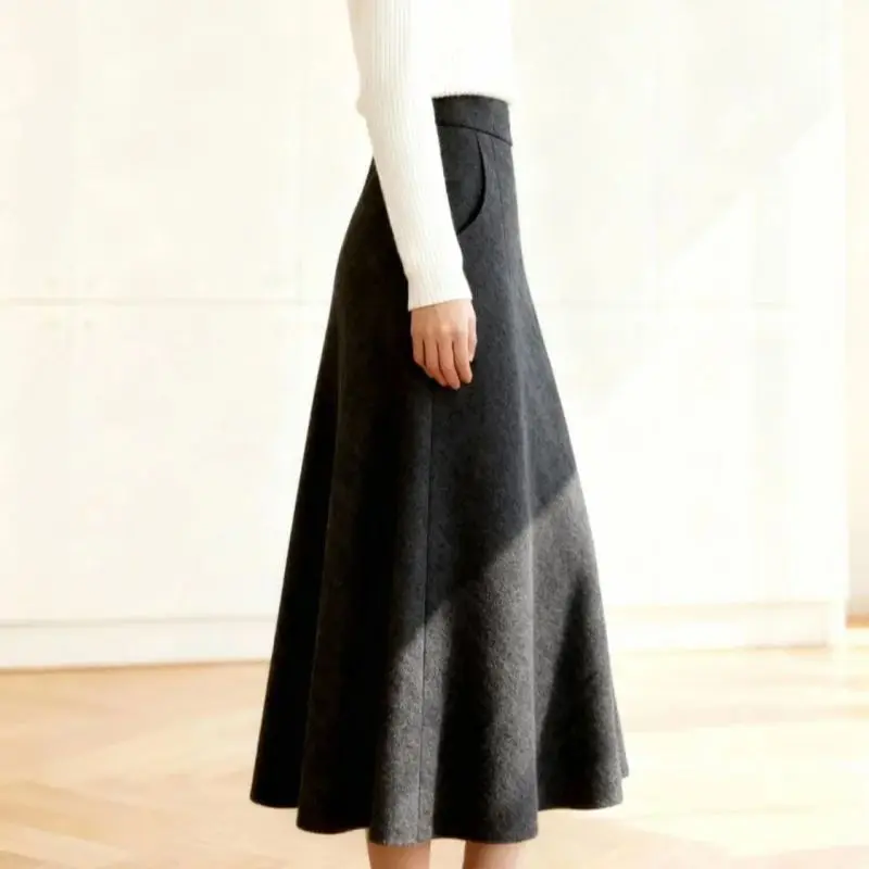 Новая модная шерстяная юбка женская осень-зима теплая с высокой талией трапециевидной формы однотонные элегантные длинные юбки офисные женские юбки
Новая модная шерстяная юбка женская осень-зима теплая с высокой талией трапециевидной формы однотонные элегантные длинные юбки офисные женские юбки