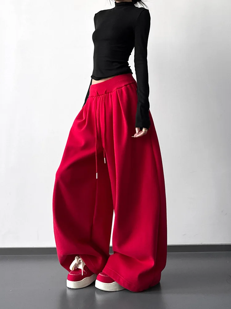 Женские утолщенные красные брюки на флисовой подкладке, осень-зима, повседневные прямые спортивные штаны с широкими штанинами, спортивные брюки длиной до пола с манжетами
Женские утолщенные красные брюки на флисовой подкладке, осень-зима, повседневные прямые спортивные штаны с широкими штанинами, спортивные брюки длиной до пола с манжетами