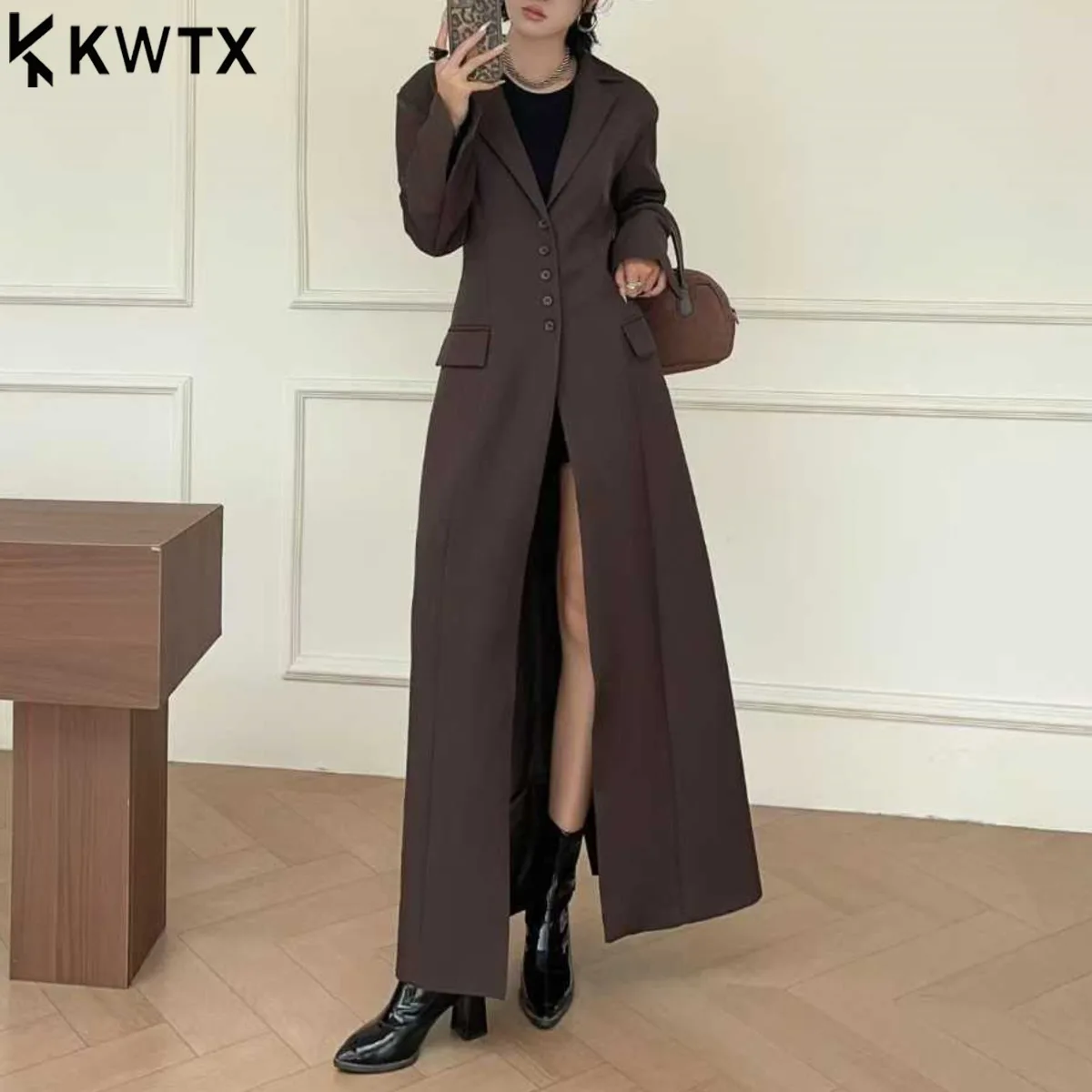 KWTX 2025 Тренч женский длинный халат с высоким разрезом и зубчатыми лацканами однобортный однотонный осенне-зимний повседневный одяг 
KWTX 2025 Тренч женский длинный халат с высоким разрезом и зубчатыми лацканами однобортный однотонный осенне-зимний повседневный одяг