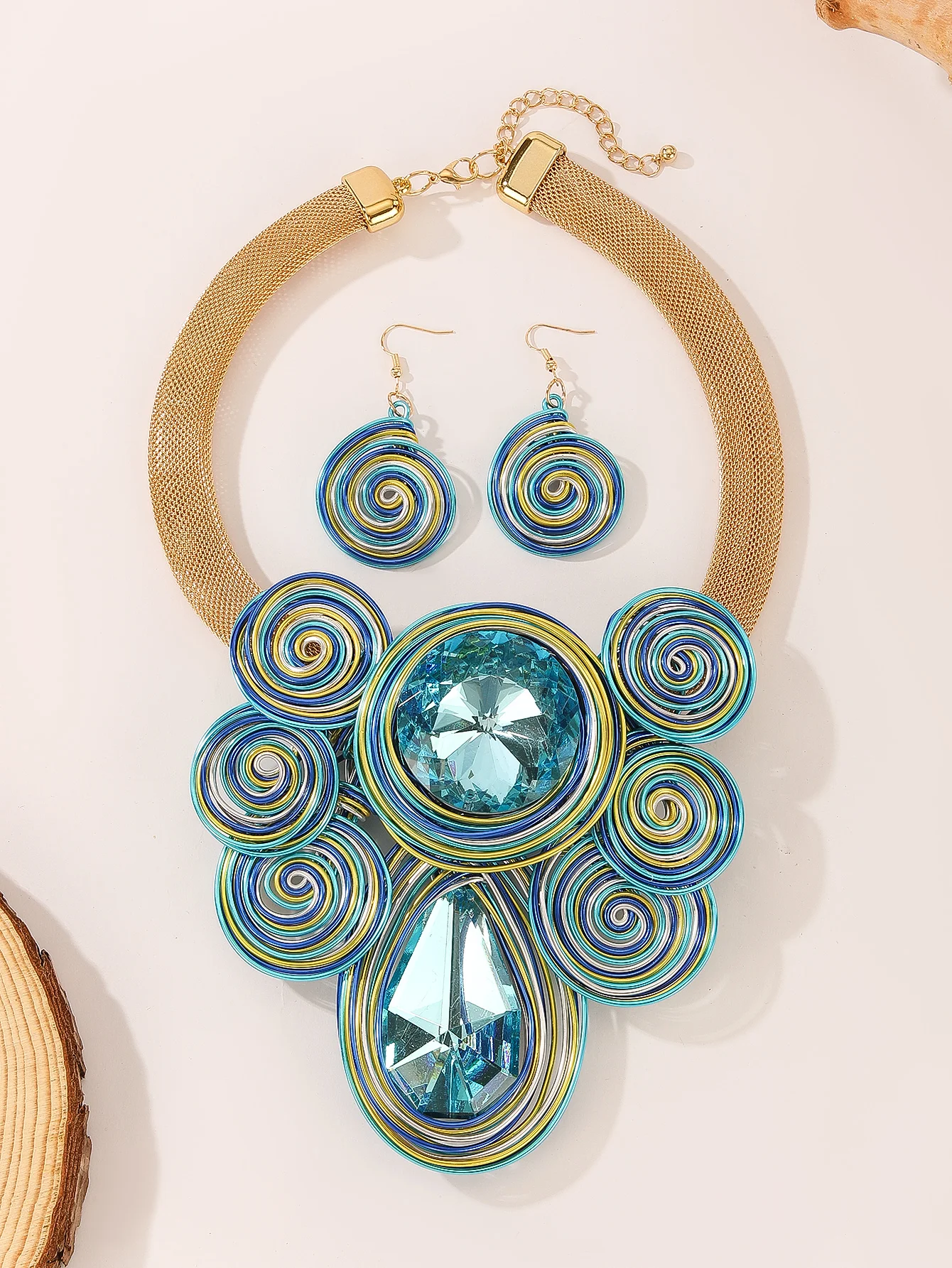 A set of new light blue jewelry featuring a stylish crystal gemstone aluminum wire woven large necklace and earrings
A set of new light blue jewelry featuring a stylish crystal gemstone aluminum wire woven large necklace and earrings