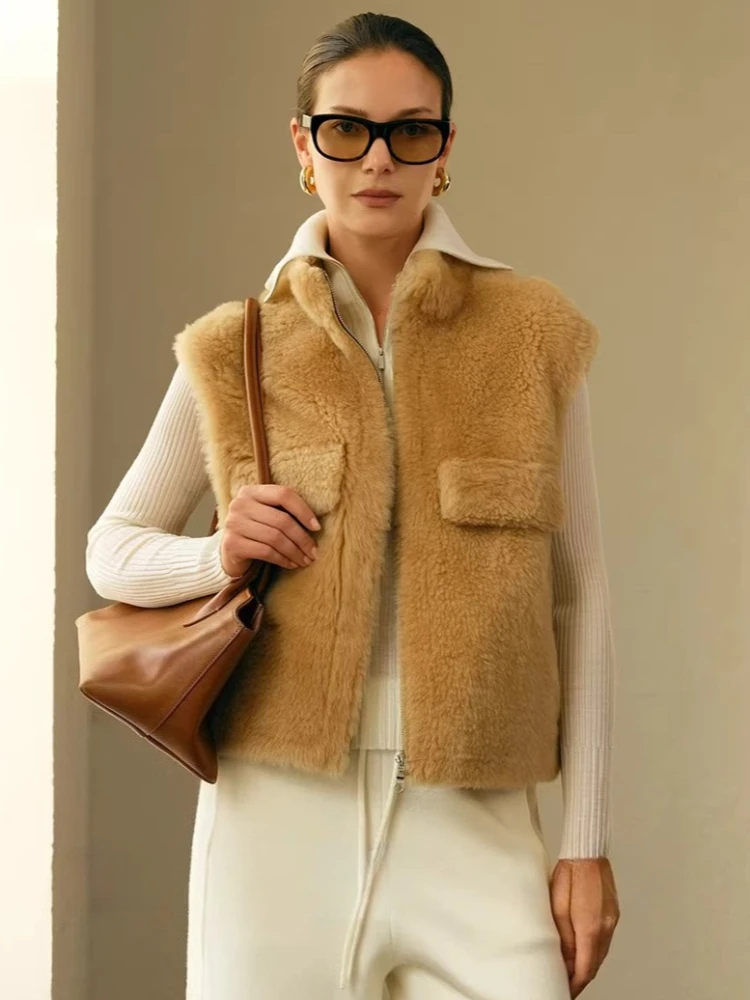 High-end Luxury Lacon Lamb Fur Sleeveless Vest Jackets for Women Simple Stand Collar Short Winter Genuine Leather Real Fur Coat
High-end Luxury Lacon Lamb Fur Sleeveless Vest Jackets for Women Simple Stand Collar Short Winter Genuine Leather Real Fur Coat