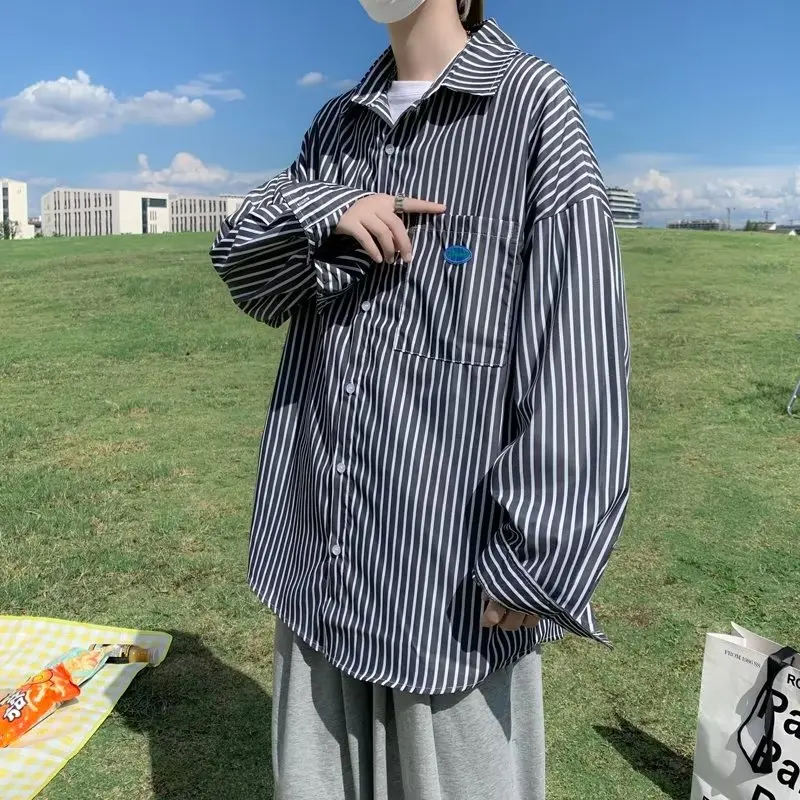 Autumn Large Size 250 Pou Striped Long Sve Men's irt Hong Kong Sle Casual Faion Outerwear Boyfriend irt
Autumn Large Size 250 Pou Striped Long Sve Men's irt Hong Kong Sle Casual Faion Outerwear Boyfriend irt