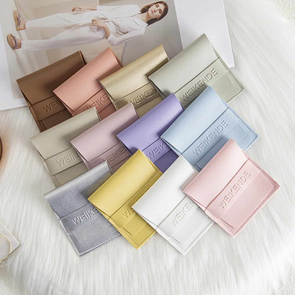 50pcs Bulk White 8*8cm PU Leather Bags Jewelry Pouches Travel Jewelry Earrings Necklace Rings Package Envelope Bags Custom Logo
50pcs Bulk White 8*8cm PU Leather Bags Jewelry Pouches Travel Jewelry Earrings Necklace Rings Package Envelope Bags Custom Logo