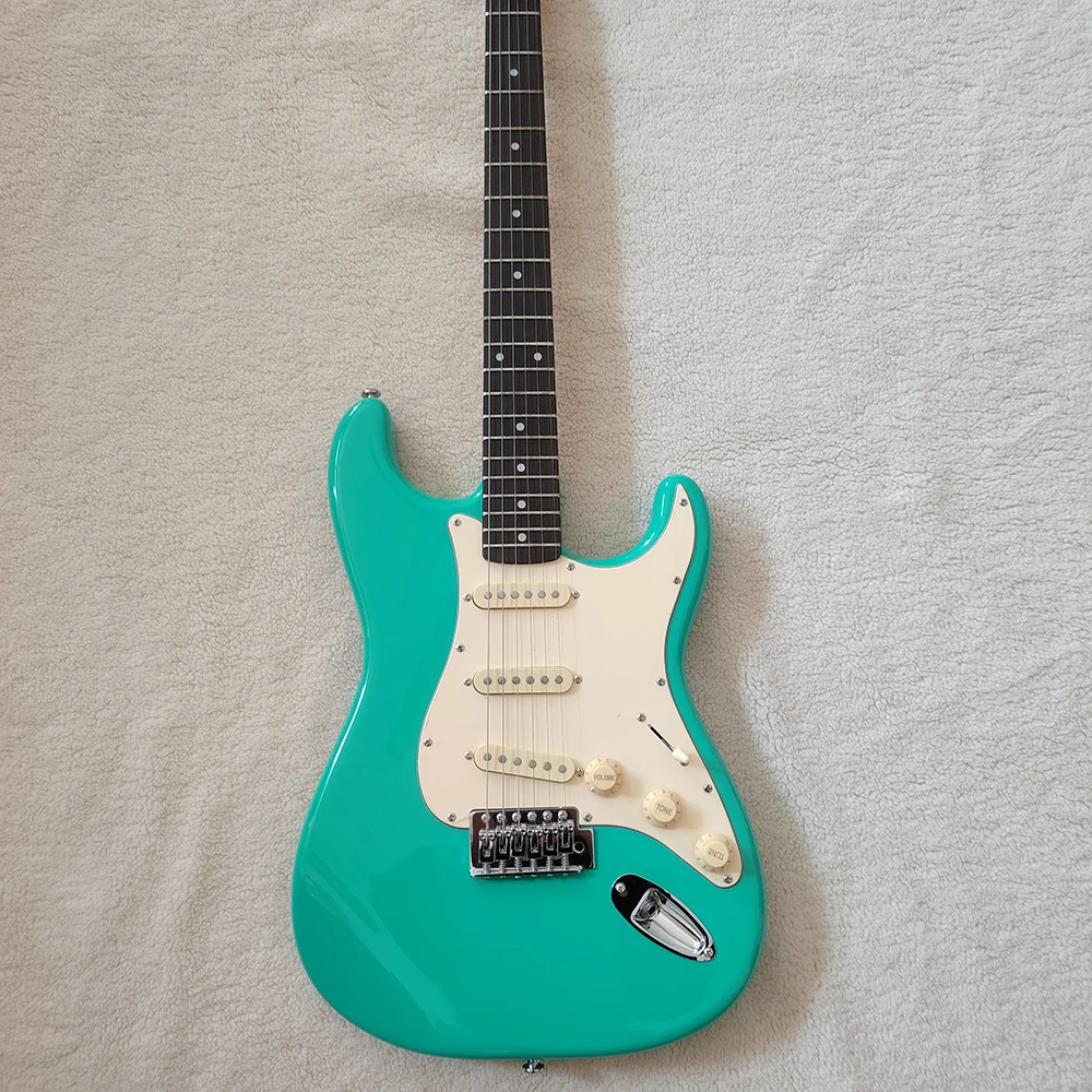 21Frets surfing green electric guitar, yellow pickup and guard, maple neck, nickel chromium hardware
21Frets surfing green electric guitar, yellow pickup and guard, maple neck, nickel chromium hardware