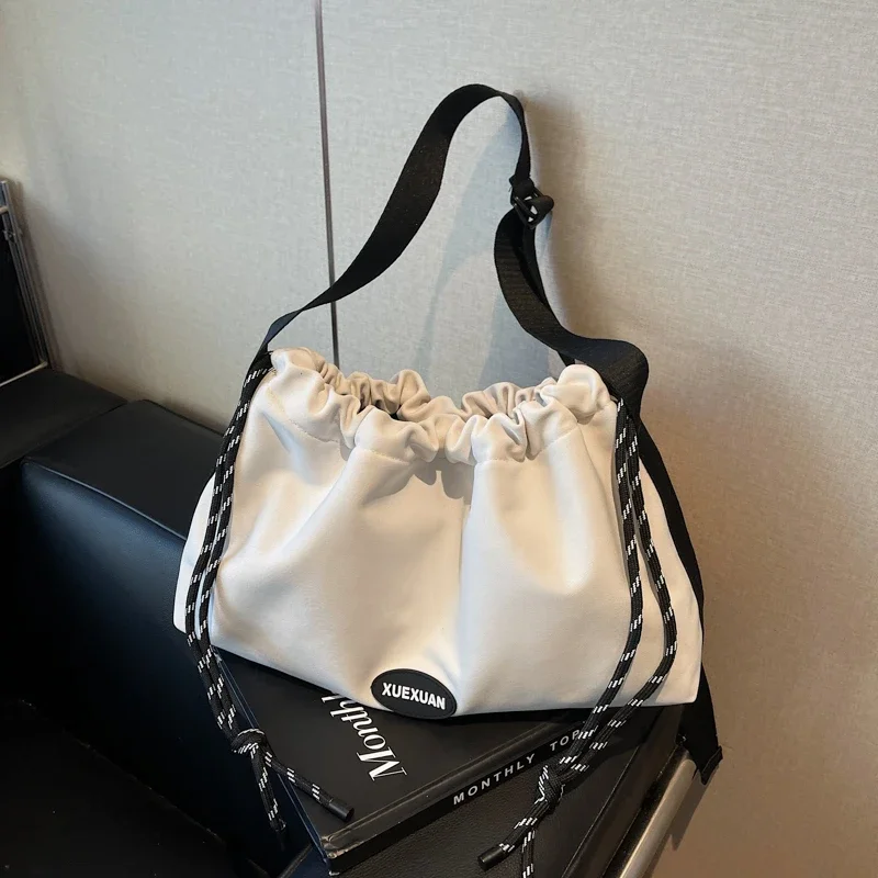 Knot Shoulder Bag for Women 2025 New Style Simple and Versatile Casual Crossbody Bag Commuting Nylon Sports Style Dumpling Bag
Knot Shoulder Bag for Women 2025 New Style Simple and Versatile Casual Crossbody Bag Commuting Nylon Sports Style Dumpling Bag