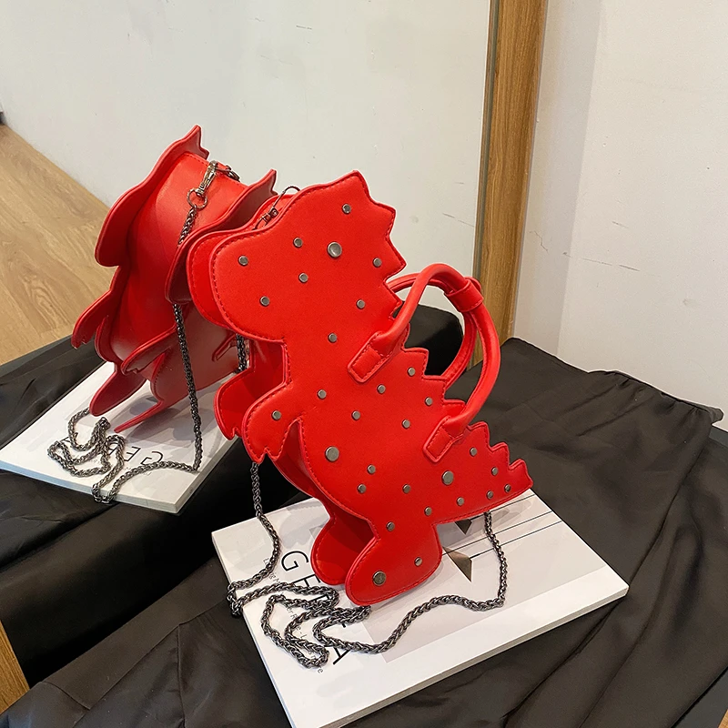 Новые забавные женские сумки-кроссбоди 2026 года в форме динозавра из ПУ с молнией и заклепками, нишевые сумки для повседневного использования
Новые забавные женские сумки-кроссбоди 2026 года в форме динозавра из ПУ с молнией и заклепками, нишевые сумки для повседневного использования