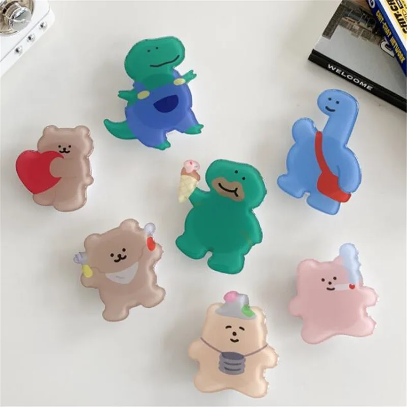 Расширяющаяся подставка с изображением медведя и динозавра, крепление для телефона, складная розетка для мобильных смартфонов, карманный настольный кронштейн, подставка для телефона, держатель
Расширяющаяся подставка с изображением медведя и динозавра, крепление для телефона, складная розетка для мобильных смартфонов, карманный настольный кронштейн, подставка для телефона, держатель