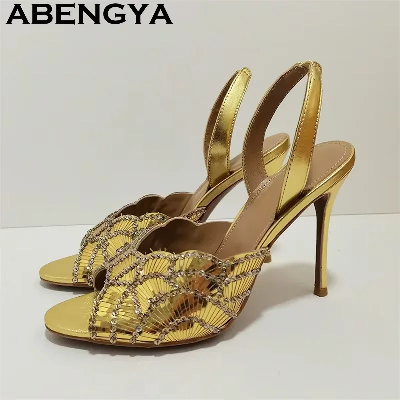 Горячая новинка: летние блестящие босоножки-шпильки с кристаллами, женские туфли на высоком каблуке с пайетками для вечеринок, кожаные женские сандалии с ремешком на пятке
Горячая новинка: летние блестящие босоножки-шпильки с кристаллами, женские туфли на высоком каблуке с пайетками для вечеринок, кожаные женские сандалии с ремешком на пятке
