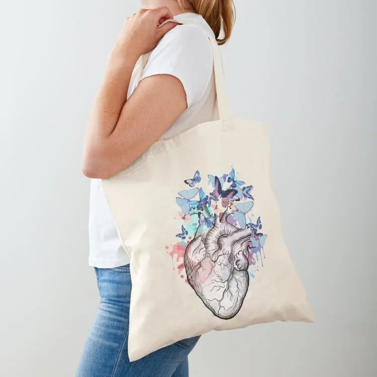 human heart with blue butterflies, black, watercolor style, anatomy art Tote Bag Shopper handbag shopping cart bags Eco bag
human heart with blue butterflies, black, watercolor style, anatomy art Tote Bag Shopper handbag shopping cart bags Eco bag