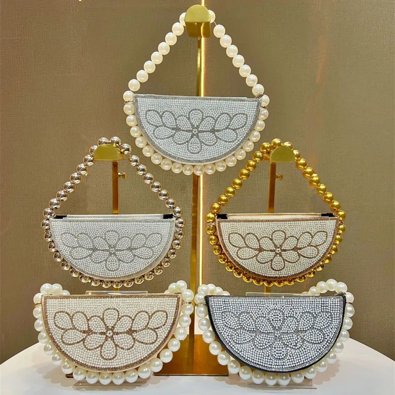 2025 New Fashion Luxury Women Beaded Diamond Evening Bag Big Pearl Handle Handbag High end Wedding Party Clutch Bag Shoulder Bag 
2025 New Fashion Luxury Women Beaded Diamond Evening Bag Big Pearl Handle Handbag High end Wedding Party Clutch Bag Shoulder Bag