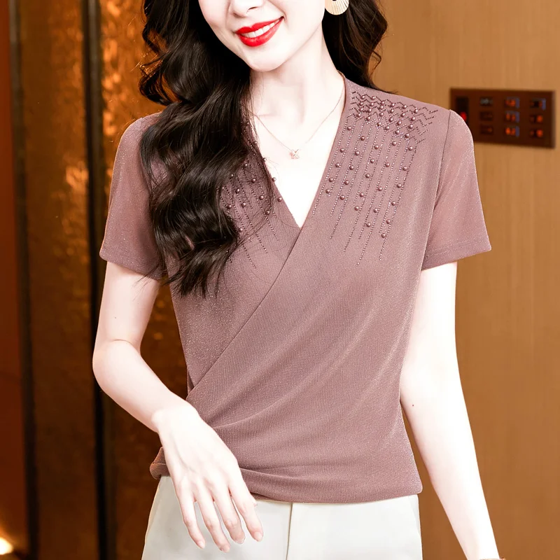 New 2025 Summer Cross Mesh Tops V-neck Solid Color Hot Diamond T Shirt Bright Silk Beaded Short Sleeved Women Shirt
New 2025 Summer Cross Mesh Tops V-neck Solid Color Hot Diamond T Shirt Bright Silk Beaded Short Sleeved Women Shirt