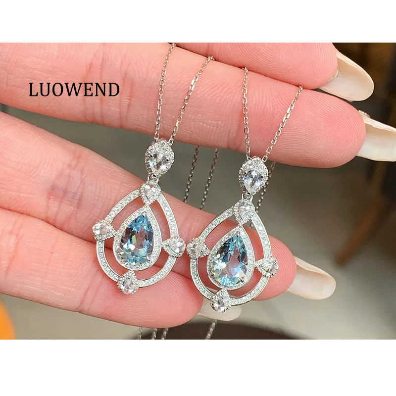 LUOWEND 100% ожерелье из белого золота 18 карат, роскошное элегантное стильное блестящее ожерелье с бриллиантами и натуральным аквамарином для женщин, ювелирные изделия
LUOWEND 100% ожерелье из белого золота 18 карат, роскошное элегантное стильное блестящее ожерелье с бриллиантами и натуральным аквамарином для женщин, ювелирные изделия