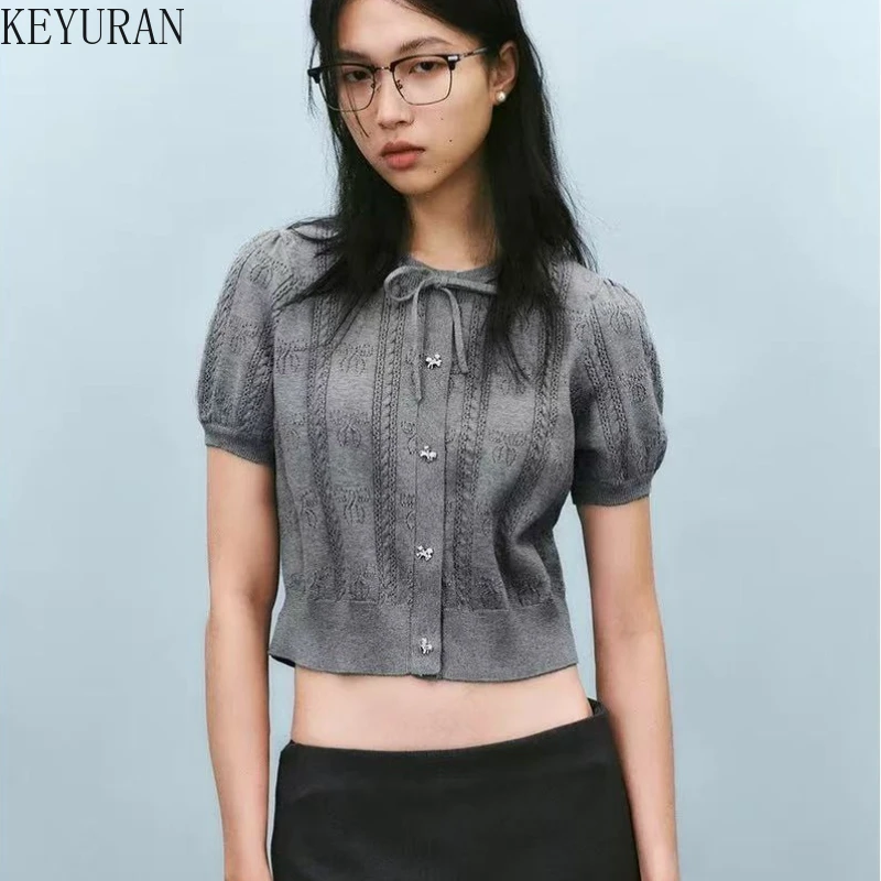 Grey Hollow Out Thin Knit Cardigan Sweater Women 2025 Summer Stylish Chic Bowtie Short Sleeve Crop Tops Ladies Knitwear Jumpers
Grey Hollow Out Thin Knit Cardigan Sweater Women 2025 Summer Stylish Chic Bowtie Short Sleeve Crop Tops Ladies Knitwear Jumpers