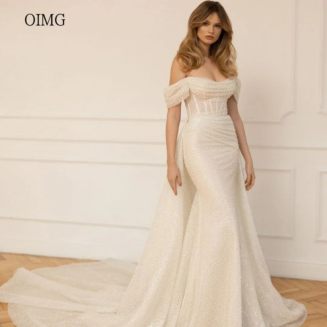 OIMG Exquisite Mermaid Wedding Dress Bead Off The Shoulder Dresses Saudi Big Tail Wedding Gowns vestidos para mujer Customized
OIMG Exquisite Mermaid Wedding Dress Bead Off The Shoulder Dresses Saudi Big Tail Wedding Gowns vestidos para mujer Customized