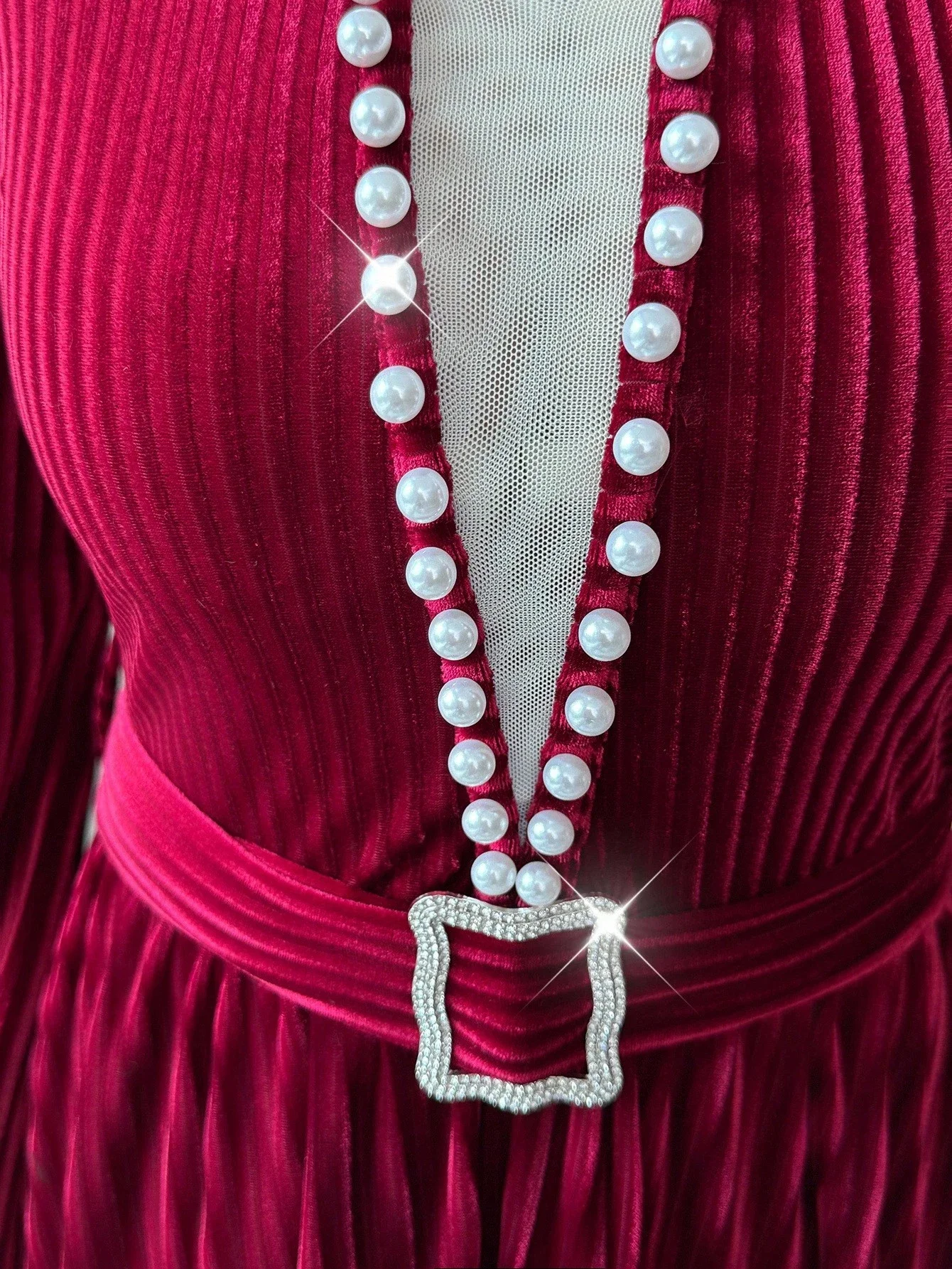 Elegant Burgundy Ribbed Velvet Maxi Dress With Pearl Trim And Rhinestone Belt
Elegant Burgundy Ribbed Velvet Maxi Dress With Pearl Trim And Rhinestone Belt