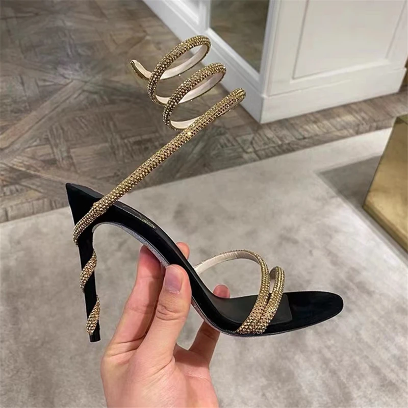 Sexy Black Snake Wrap Sandals Gold Slingback Sandals White Heel Rhinestone Party Dress Women's High Heels footwear size 40
Sexy Black Snake Wrap Sandals Gold Slingback Sandals White Heel Rhinestone Party Dress Women's High Heels footwear size 40