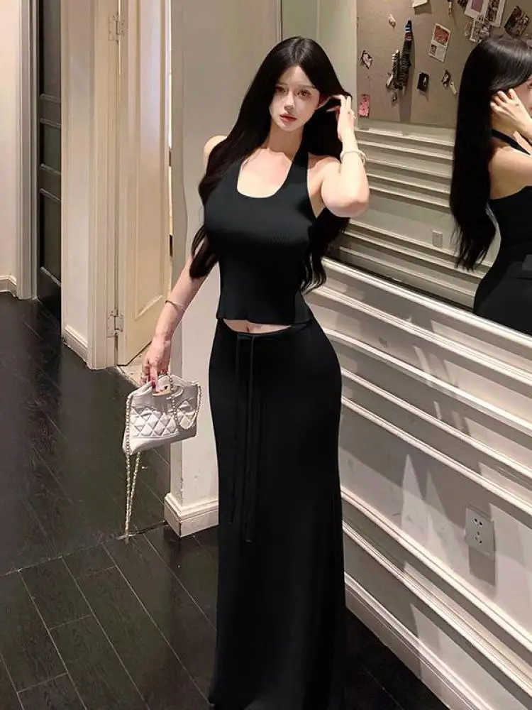 Summer Women Solid Sexy Sleeveless Halter Backless Knit Tops And High Waist Drawstring Lace-up Long Skirt Beach Two Piece Sets
Summer Women Solid Sexy Sleeveless Halter Backless Knit Tops And High Waist Drawstring Lace-up Long Skirt Beach Two Piece Sets