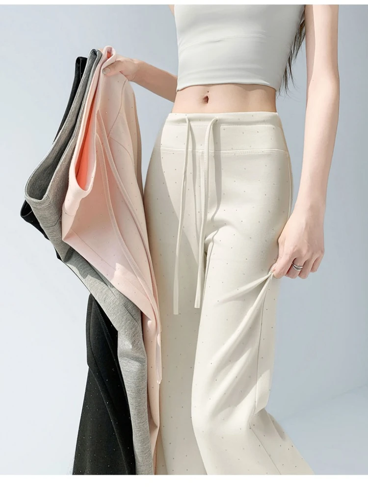 Ice silk hot stamping design bell bottom pants women summer 2026 new high waist slimming casual solid color drawstring pants
Ice silk hot stamping design bell bottom pants women summer 2026 new high waist slimming casual solid color drawstring pants