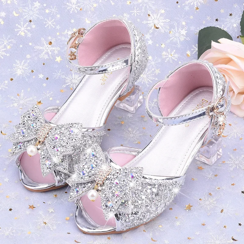 Fashion Bow Children's Sandals Summer Girls Crystal Princess Shoes 2025 New Girls High Heels Student Performance Dance Shoes
Fashion Bow Children's Sandals Summer Girls Crystal Princess Shoes 2025 New Girls High Heels Student Performance Dance Shoes