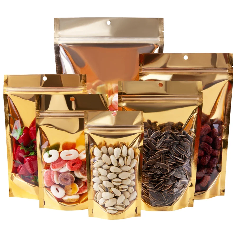 100Pcs Gold Aluminum Foil Clear Bag Zip Lock with Hang Hole Stand Up Tear Notch Reusable Food Nut Candy Packaging Pouches
100Pcs Gold Aluminum Foil Clear Bag Zip Lock with Hang Hole Stand Up Tear Notch Reusable Food Nut Candy Packaging Pouches