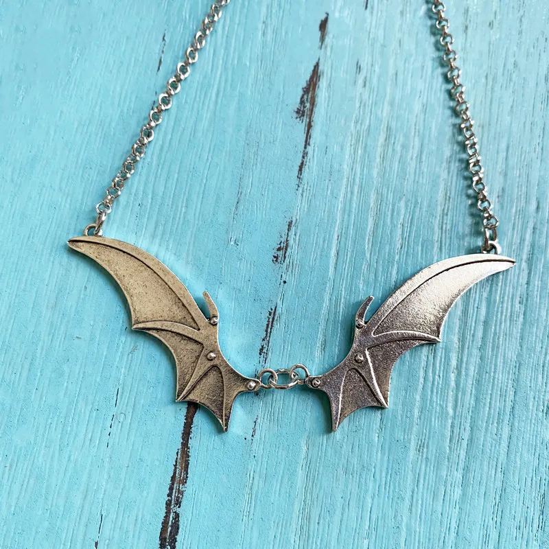 Gothic Bat Wing Pendant Necklace Vampire Inspired Black Oxidized Metal Chain Link Adjustable Length Lightweight Edgy
Gothic Bat Wing Pendant Necklace Vampire Inspired Black Oxidized Metal Chain Link Adjustable Length Lightweight Edgy