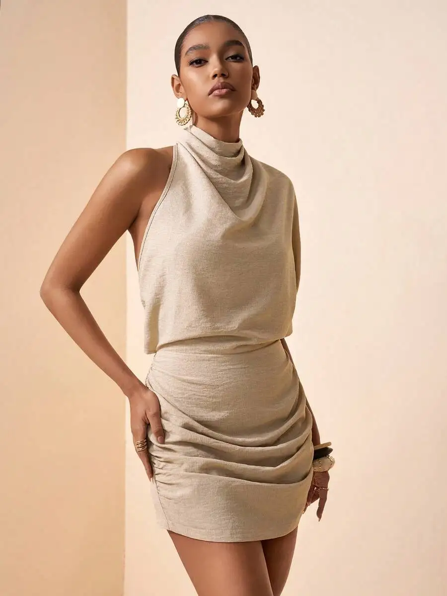 Beige Linen Crop Top And Ruched Mini Skirt Set With Cowl Neck And One-Shoulder Design
Beige Linen Crop Top And Ruched Mini Skirt Set With Cowl Neck And One-Shoulder Design