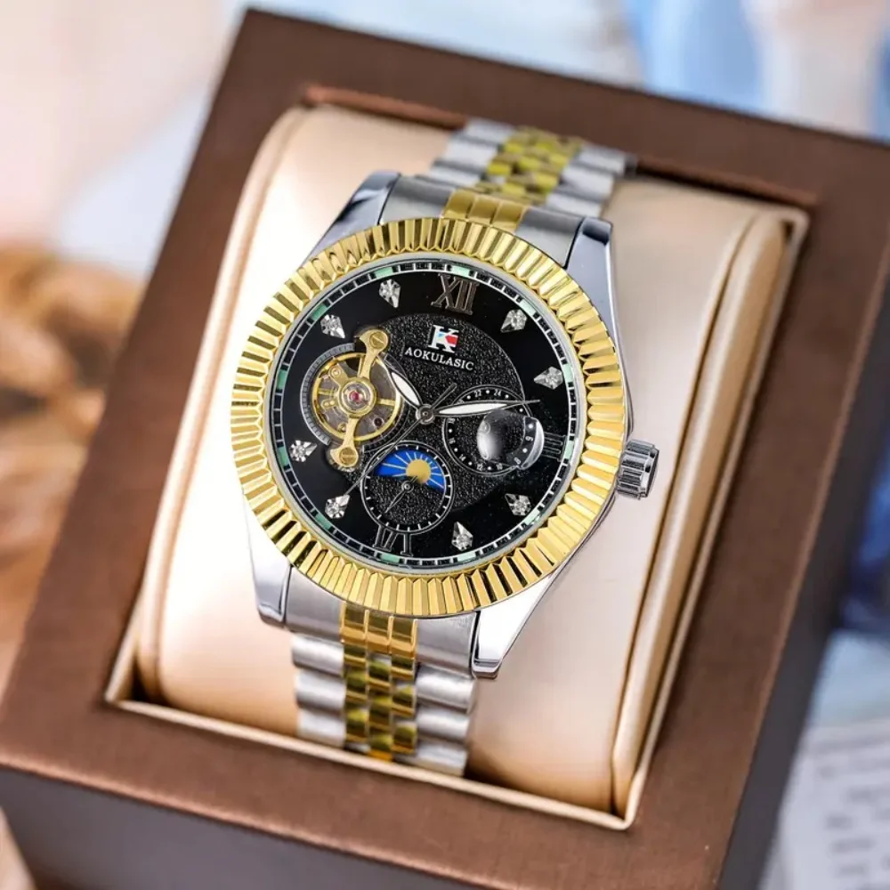 Мужские автоматические механические часы класса люкс с фазами луны, скелетонизированным циферблатом, ремешком из нержавеющей стали, модный повседневный деловой подарок
Мужские автоматические механические часы класса люкс с фазами луны, скелетонизированным циферблатом, ремешком из нержавеющей стали, модный повседневный деловой подарок