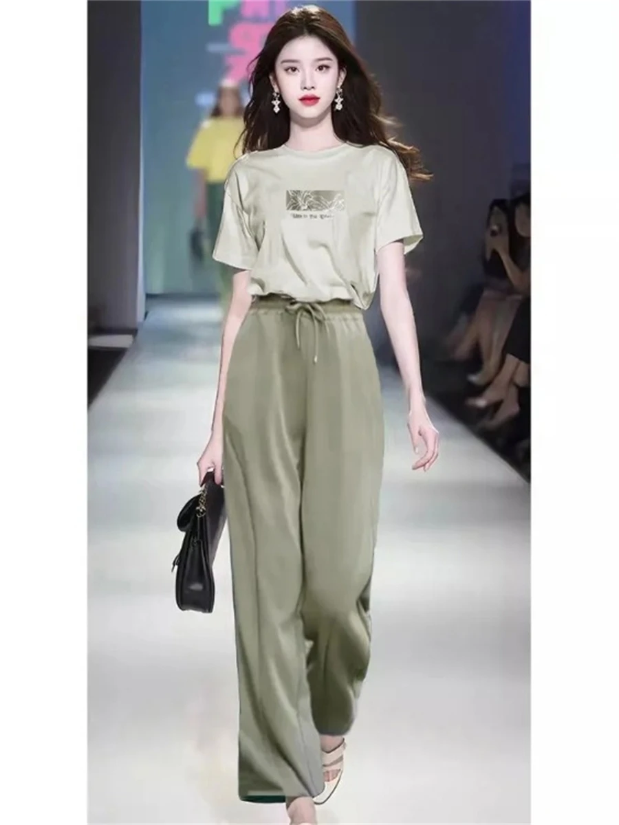 Fashionable Short Sleeve T-Shirt And Casual Pants Women's Loose Commute Summer Outfit Set Simple Stylish Two-Piece Ensemble
Fashionable Short Sleeve T-Shirt And Casual Pants Women's Loose Commute Summer Outfit Set Simple Stylish Two-Piece Ensemble