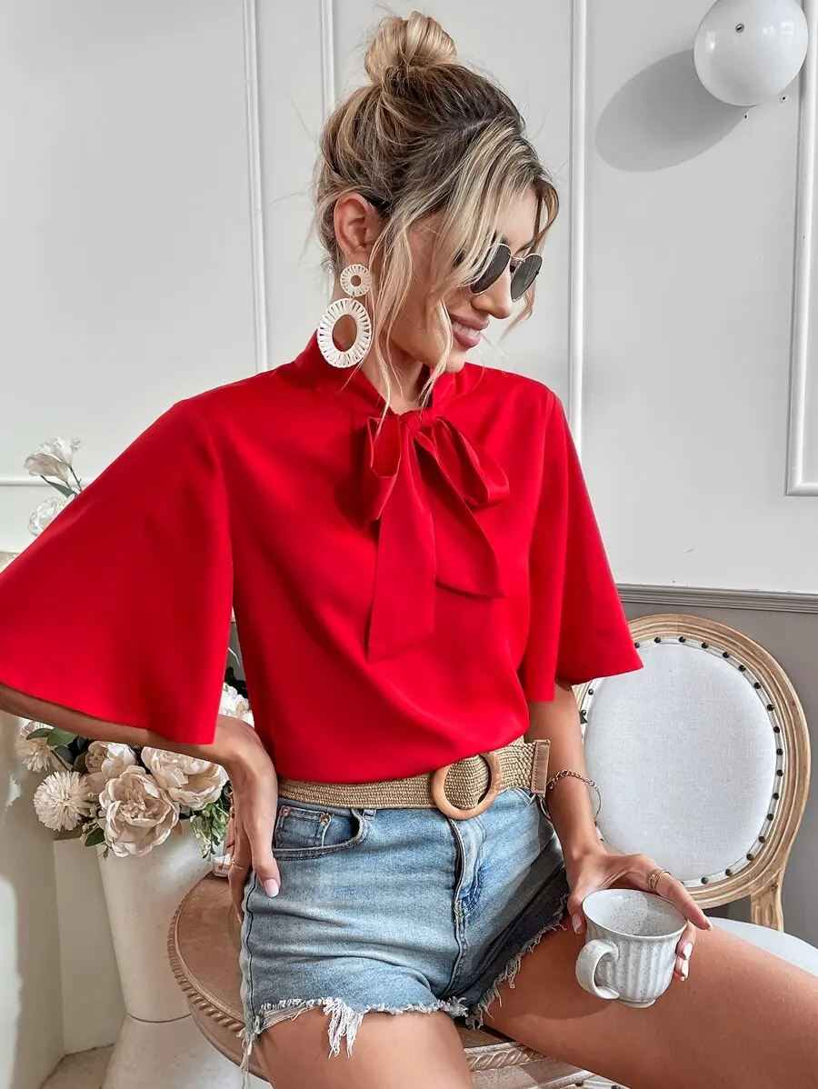 Red Tie-Neck Flounce Sleeve Blouse with Bow Detail
Red Tie-Neck Flounce Sleeve Blouse with Bow Detail