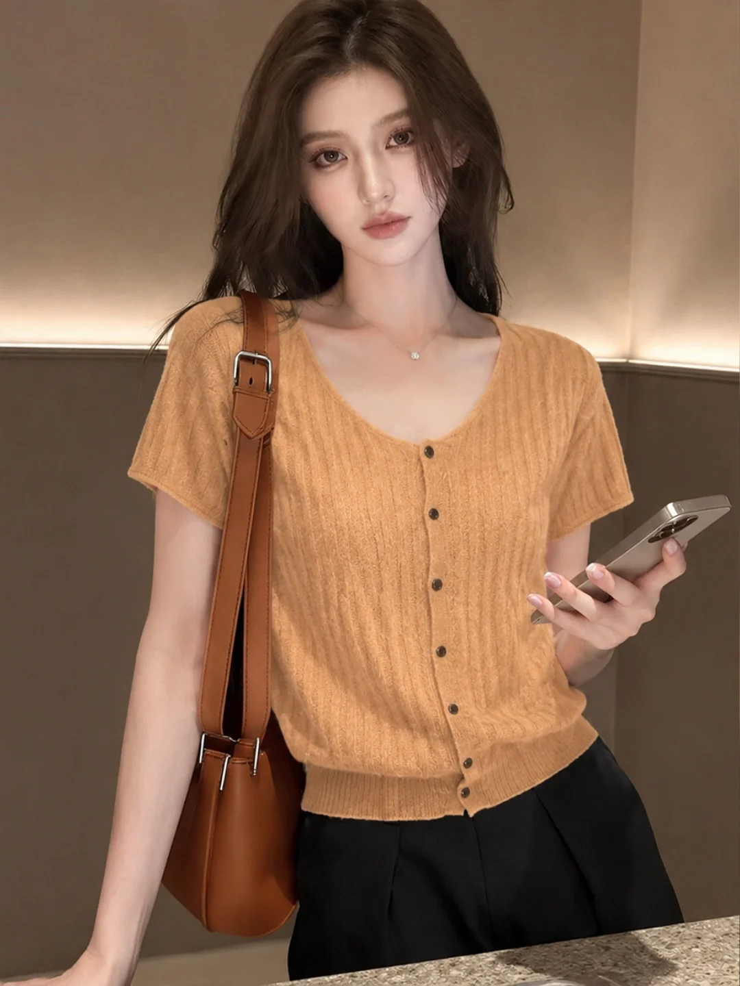 Elegant Ice Silk Knitted Open Cardigan Single Button Versatile Fashionable Summer 2026 Korean Style Straight Cut Silk Top
Elegant Ice Silk Knitted Open Cardigan Single Button Versatile Fashionable Summer 2026 Korean Style Straight Cut Silk Top