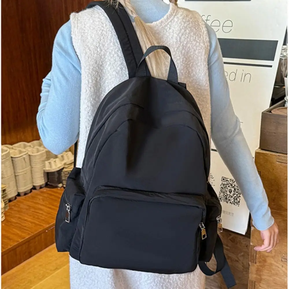 Fashion Solid Color Travel Backpack Nylon Large Capacity Students Schoolbag Multi-layer Lightweight School Bag
Fashion Solid Color Travel Backpack Nylon Large Capacity Students Schoolbag Multi-layer Lightweight School Bag